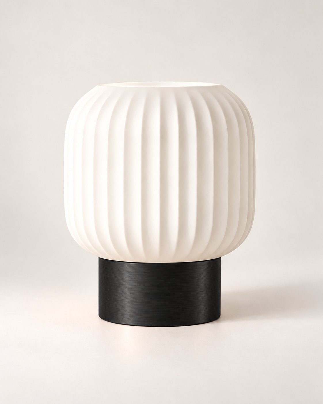 Marama pleated table lamp, white shade with Black base, studio shot, LAYR, made in New Zealand