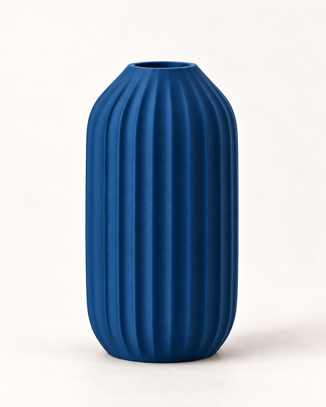 Marama tall pleated vase in Dark Blue, studio shot, LAYR, made in New Zealand