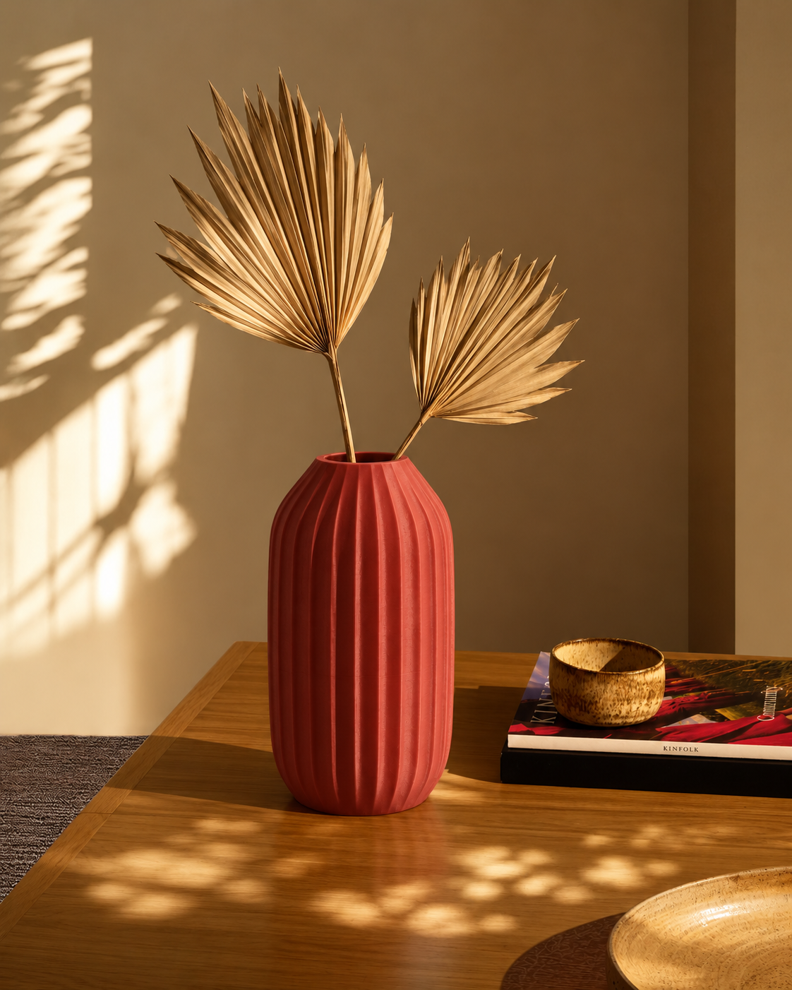 Marama tall pleated vase in Dark Red, with dried stems, dappled afternoon table, LAYR, made in New Zealand