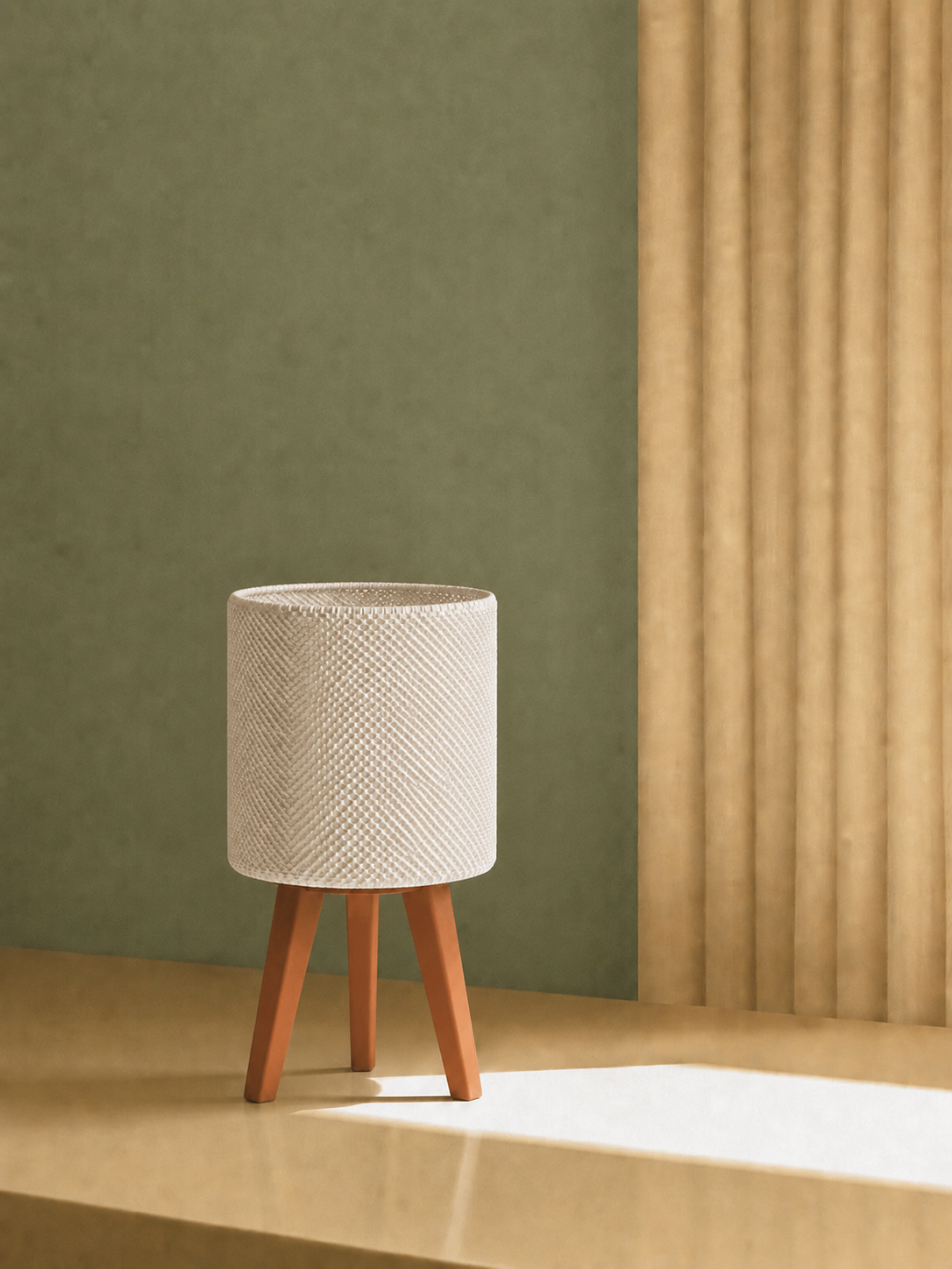 Kete lattice table lamp against an olive green wall with soft curtain shadow, matte white woven shade, LAYR, made in New Zealand