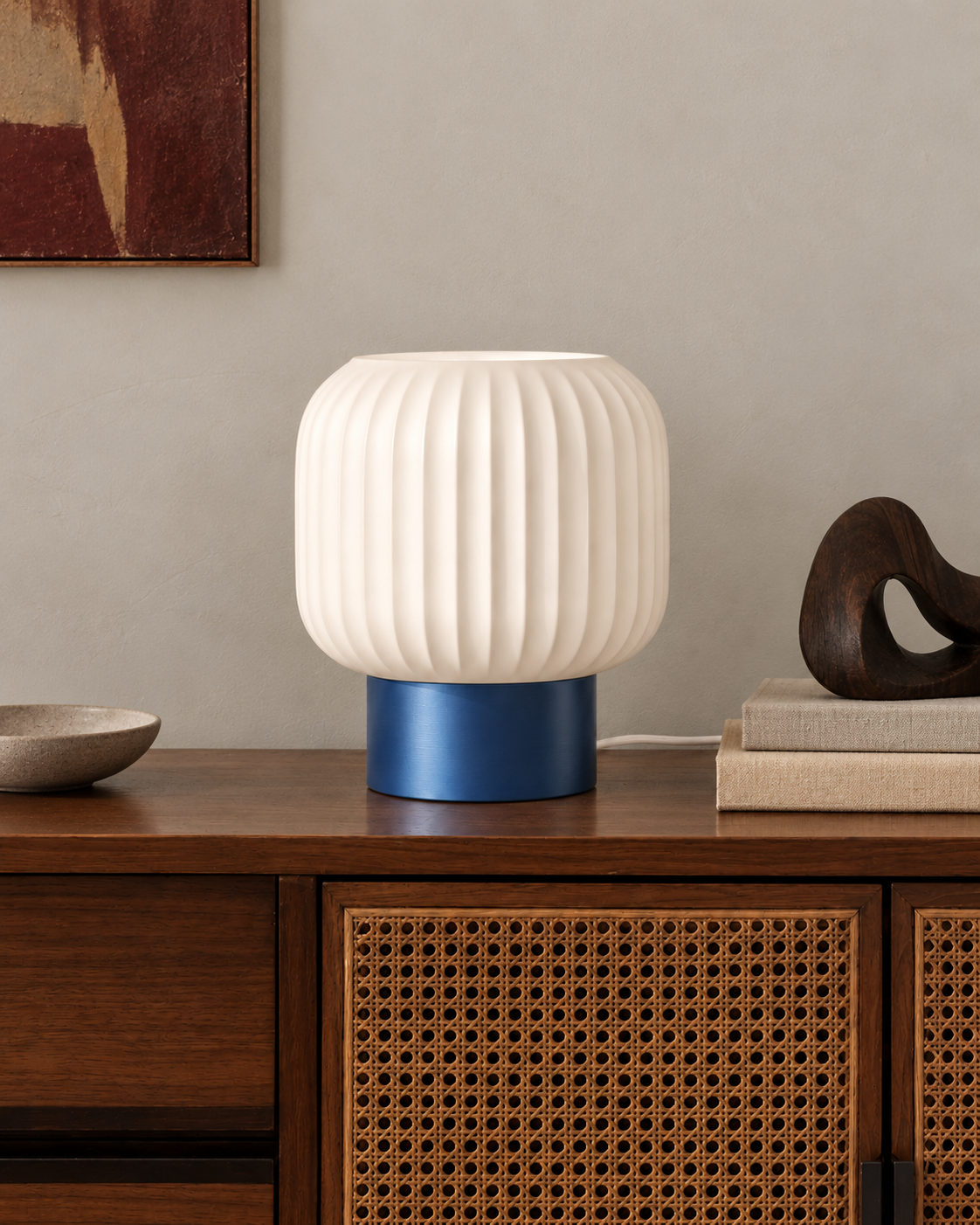Marama pleated table lamp, white shade with Cobalt Blue base, cane cabinet and sculpture, LAYR, made in New Zealand