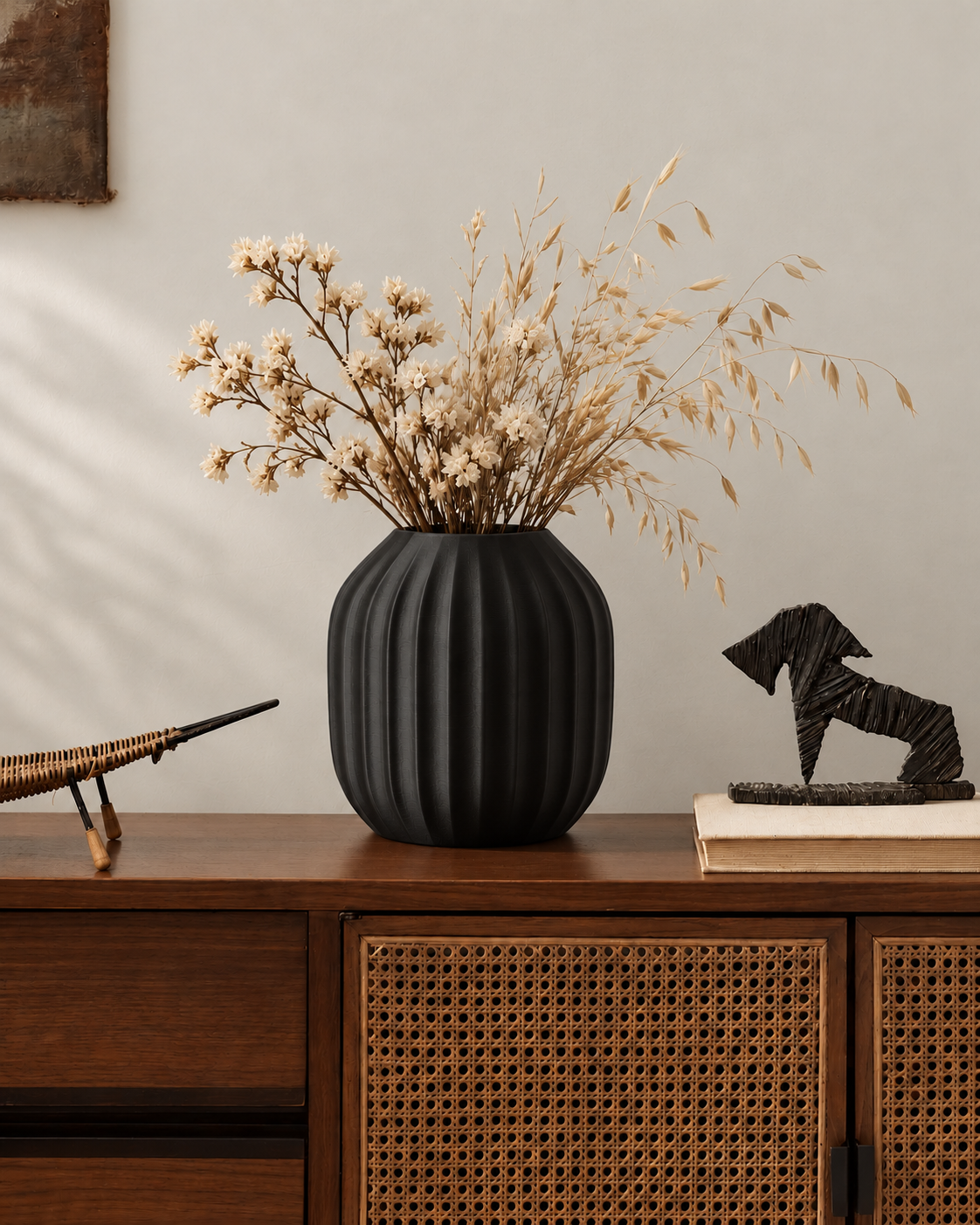 Marama round pleated vase in Charcoal, with dried stems, rattan sideboard, LAYR, made in New Zealand