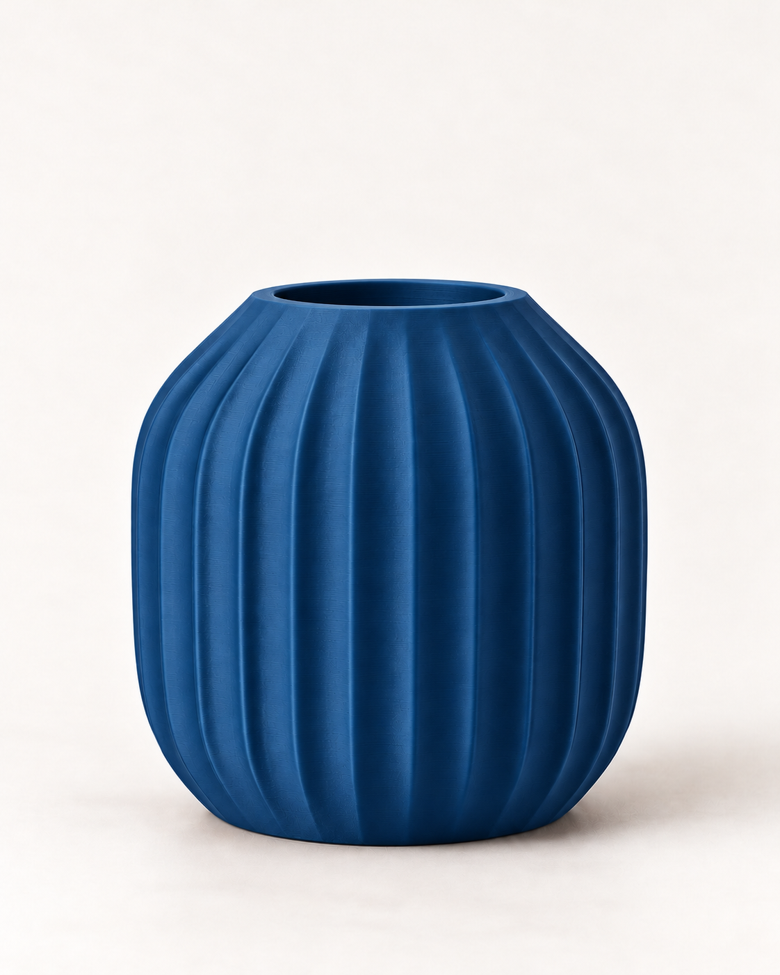 Marama round pleated vase in Dark Blue, studio shot, LAYR, made in New Zealand