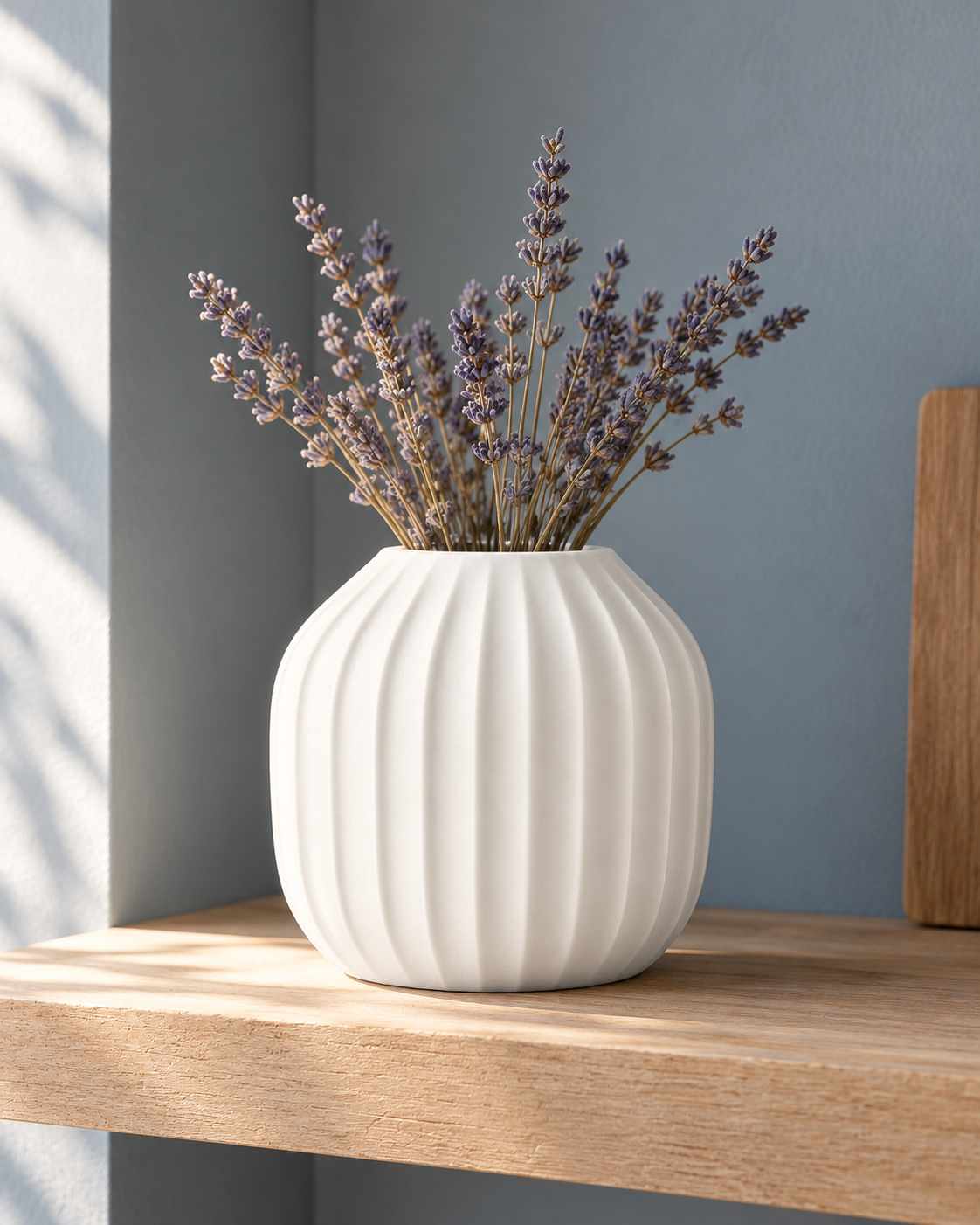 Marama round pleated vase in Ivory White, with dried stems, blue kitchen shelf, LAYR, made in New Zealand