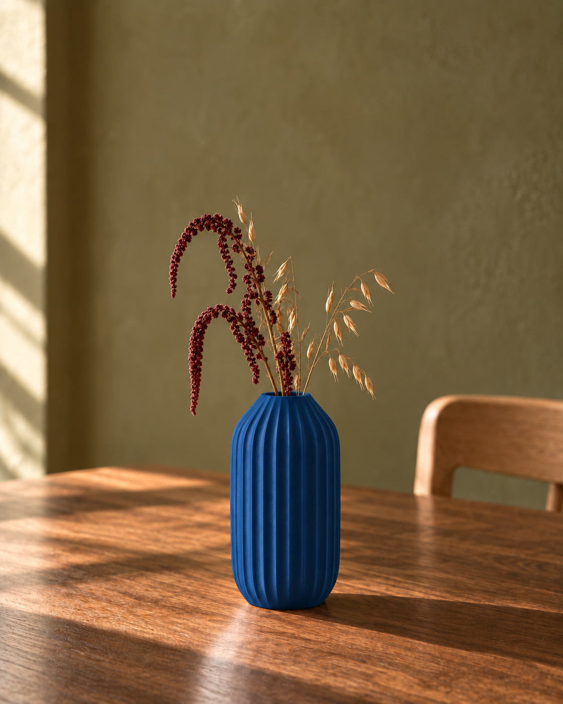 Marama tall pleated vase in Dark Blue, with dried stems, olive dining room, LAYR, made in New Zealand