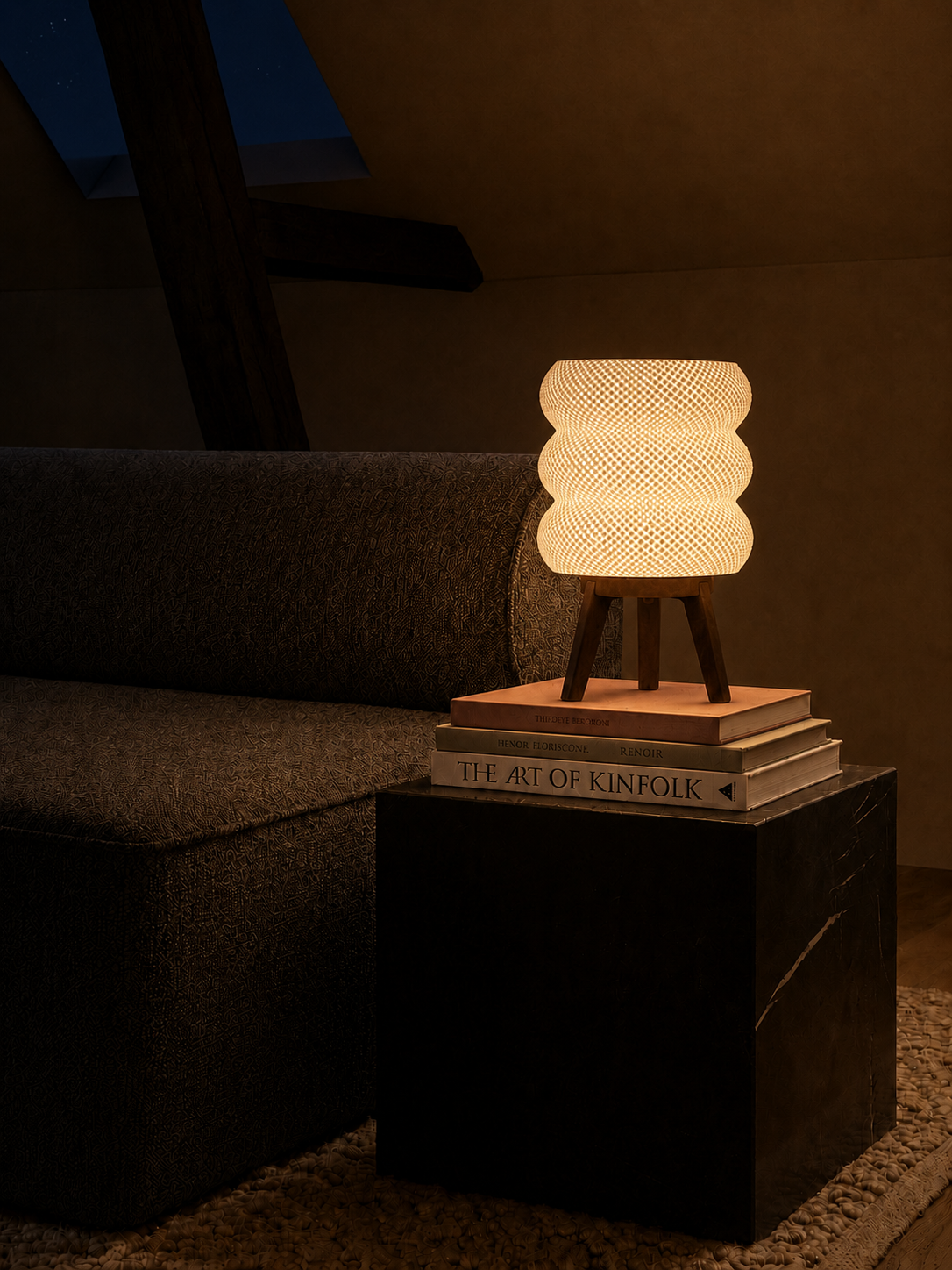 Tai table lamp glowing at night, books dark side table loft, LAYR, made in New Zealand