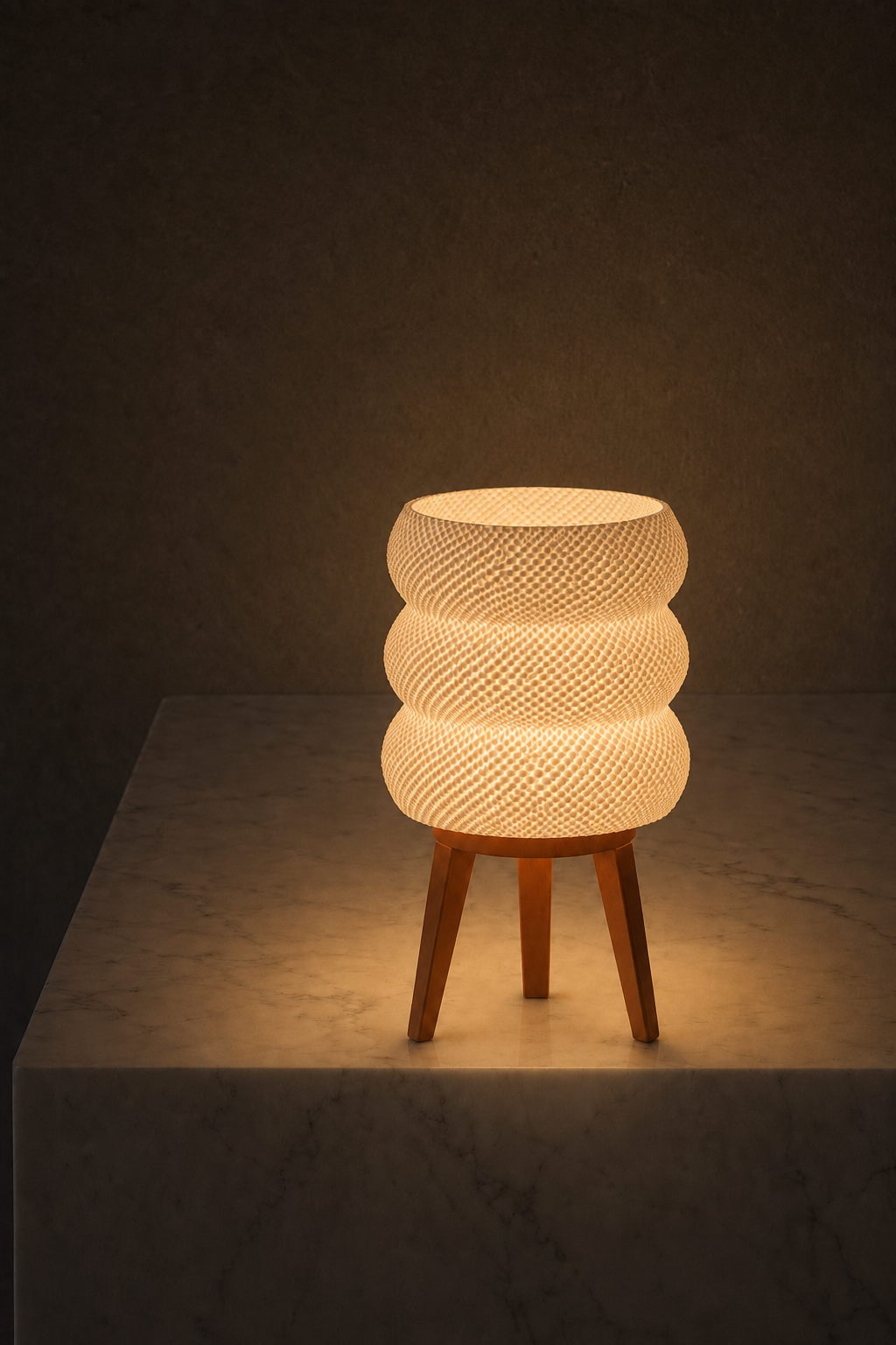 Tai table lamp glowing at night, marble surface grey background, LAYR, made in New Zealand