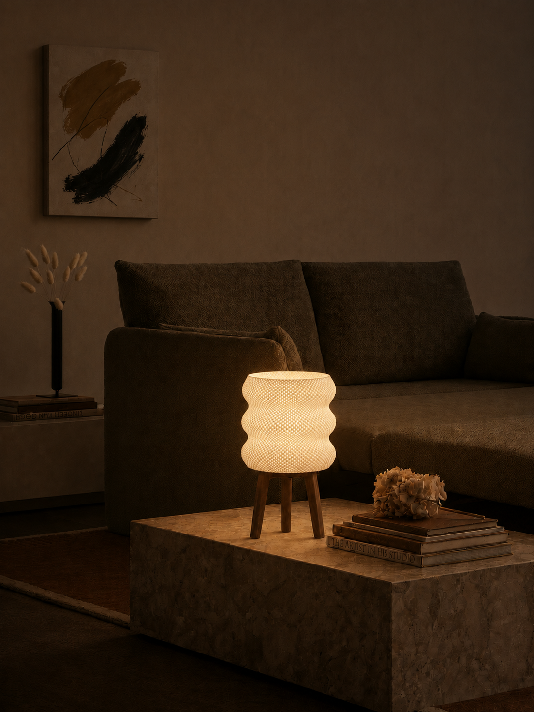 Tai table lamp glowing at night, stone table olive sofa art wall, LAYR, made in New Zealand