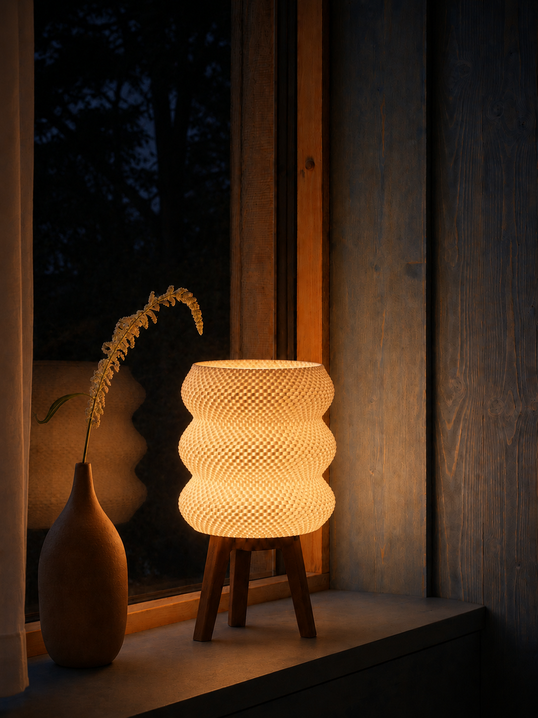 Tai table lamp glowing at night, windowsill terracotta vase, LAYR, made in New Zealand